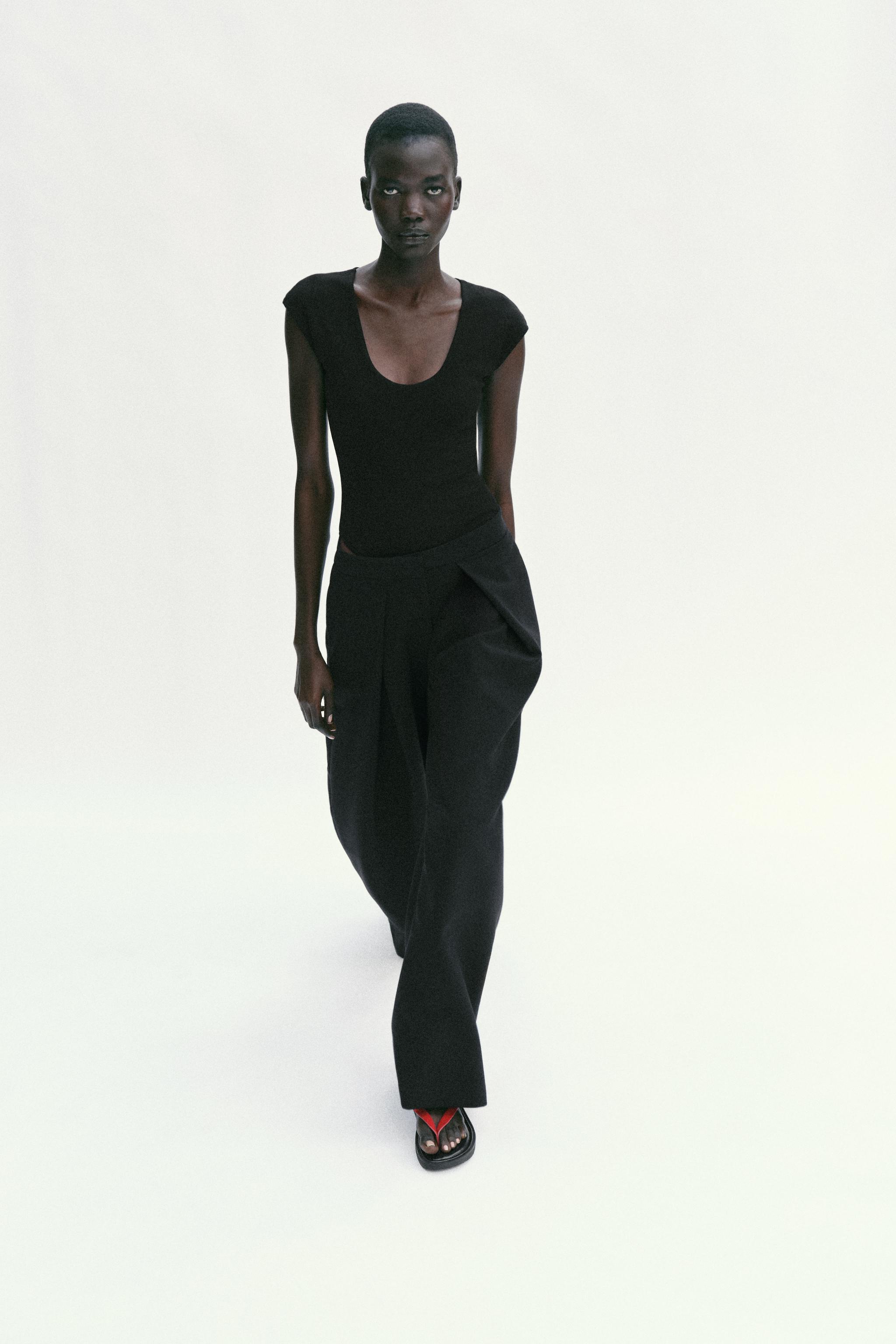 ROUND NECK BODYSUIT